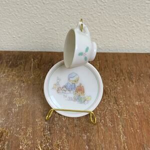 Vintage 80s Precious Moments Porcelain mini christmas teacup & saucer with stand